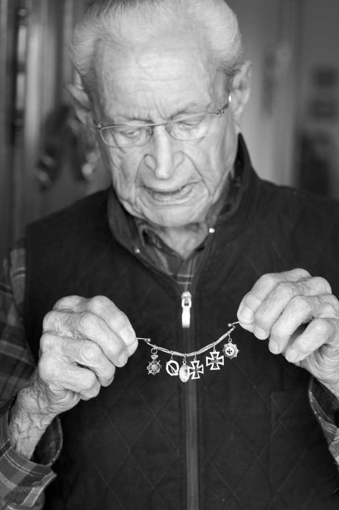 Hindenlang showing his wartime decorations, including two Iron Crosses and the German Cross in Gold